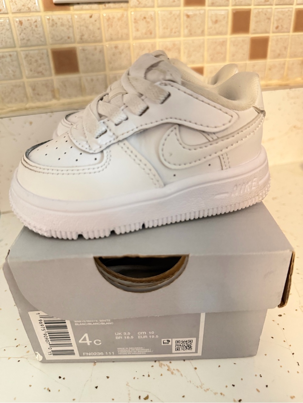 Nike Kids White Leather Low-Top Sneaker with Hook-and-Loop Strap